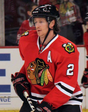 Blackhawks player Duncan Keith wears a Blackhawks jersey.