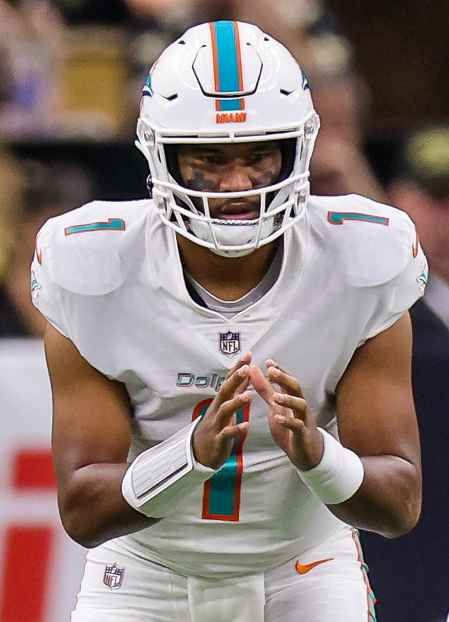 Dec 27, 2021; New Orleans, Louisiana, USA;  Miami Dolphins quarterback Tua Tagovailoa (1) calls for the ball from center Michael Deiter (63) against New Orleans Saints during the first half at Caesars Superdome. Mandatory Credit: Stephen Lew-USA TODAY Sports